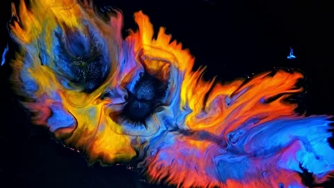 Paint texture ink flows into blue red yellow and black background Stock Footage 166090549