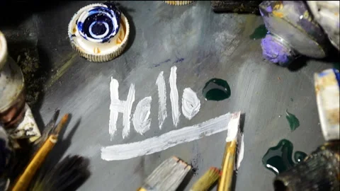 Paint in use. Drawn, written Hello. Stock-Footage 101027721