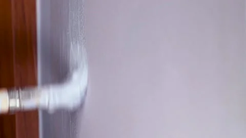Paint the wall with a brush Stock Footage 137525965