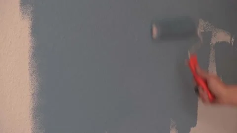 Paint wall with paint roller house, repairs in the apartment Stock Footage 164795115
