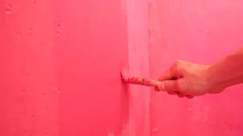 Paint the wall with a pink paint brush 動画素材 134966265