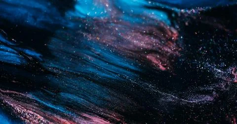 Paint wave glitter abstraction mix sparkling spill Stock Photos