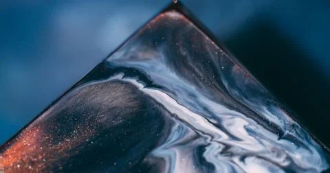 Paint wave glitter abstraction triangle mix spill Stock Photos