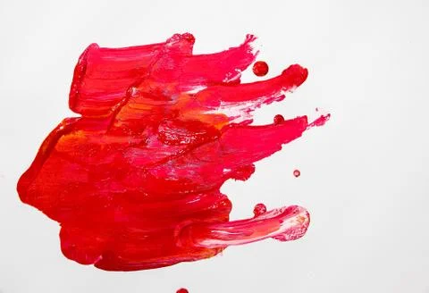 Paint on white background - red with elements of other colors. Stock Photos