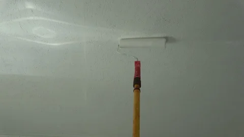 Paint in white  ceiling with paint roller Stock Footage 87676177