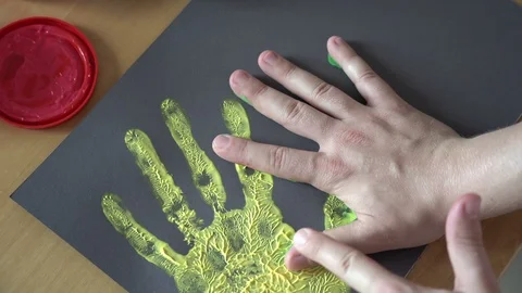 Paint your hands. Stock Footage 117853795