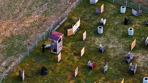 Paintball field showing game setup with bunkers and obstacles for sport activity Stock Footage 334374242