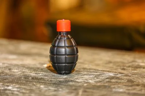 Paintball grenade with paint inside Stock Photos