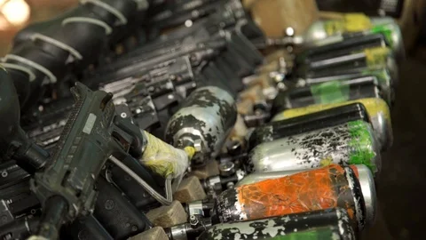 Paintball guns in a row. Stock Footage 109909475