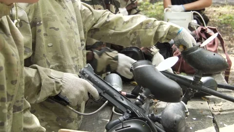 Paintball guns on the table Stock Footage 78925844