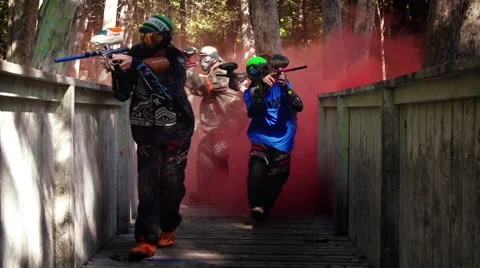 Paintball running through smoke Stock Footage 63553201