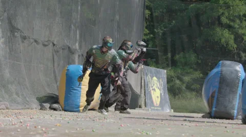 Paintballplayers start to Play in Slow Motion Stock Footage 66450563