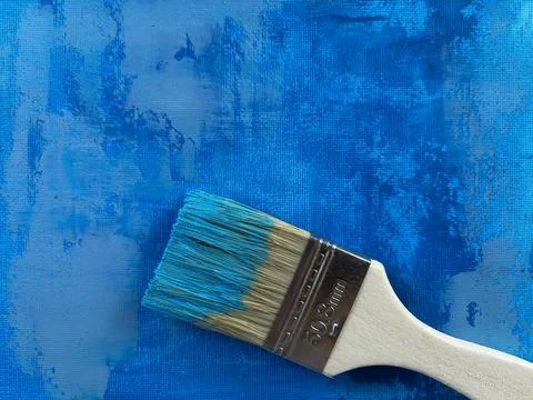 Paintbrush on Creative Abstract Blue Background Foto stock