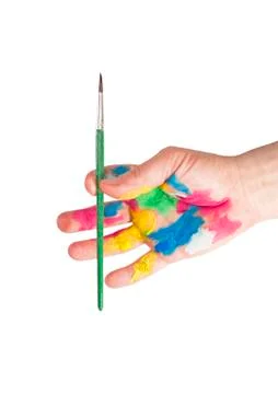 Paintbrush in hand 스톡 사진