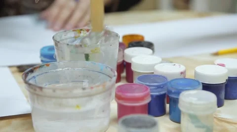 Paintbrush in a jar of water Stock Footage 59589058