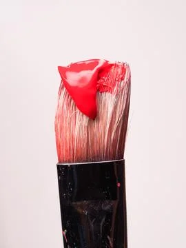 Paintbrush with red paint Stock Photos