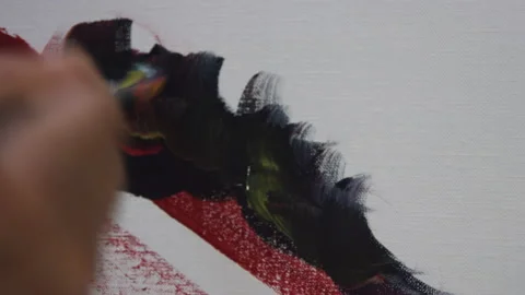 Paintbrush scribbling on a canvas Stock Footage 142098504