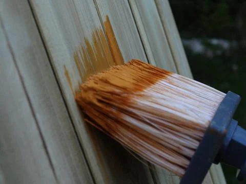 Paintbrush on wood Stock Photos