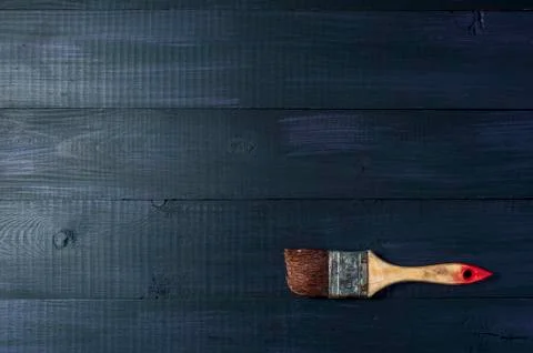 Paintbrush on wooden table Stock Photos