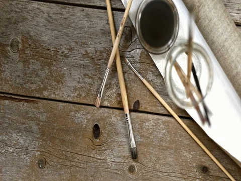 Paintbrushes and canvas Stock Footage 84711463