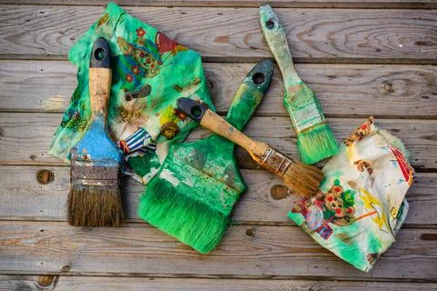 Paintbrushes of different sizes, washed after work Stock Photos