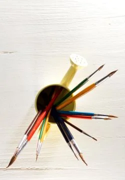 Paintbrushes on white Stock Photos