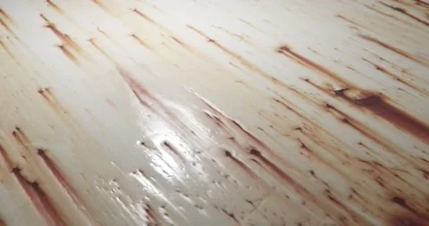 Painted aged surface with rust marks revealing behind pain. Zoom closeup scene w Stock Footage 138166207