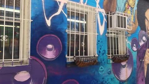 Painted alley wall with speaker patterns Stock Footage 324763092