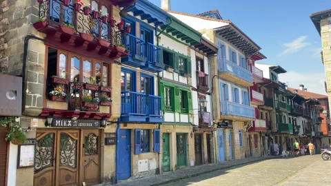 Painted Basque houses featuring colored wooden balconies in Hondarribia Stock-Footage 345145367