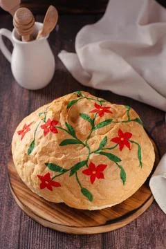 Painted bread combining hobby with creativity on the table vertical view Stock Photos