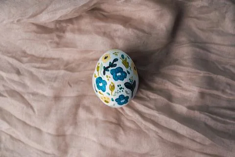 Painted chicken egg in floral pattern. DIY craft for easter holidays with kids Stock Photos