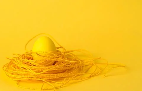 Painted chicken eggs on a yellow background. Easter eggs. copyspace Stock Illustration
