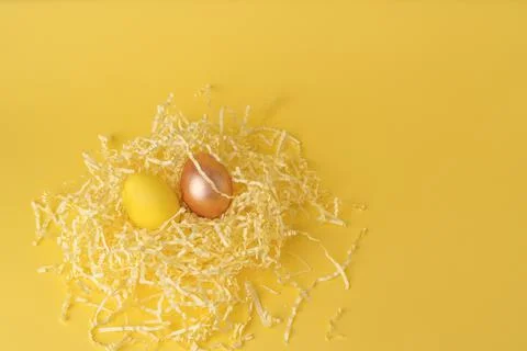 Painted chicken eggs on a yellow background. Easter eggs. copyspace Stock Illustration
