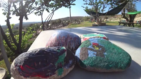 Painted Colored Stones Close Up Stock Footage 143616133