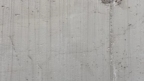 Painted concrete wall with plenty of cracks, holes and other defects Video stock 158929901
