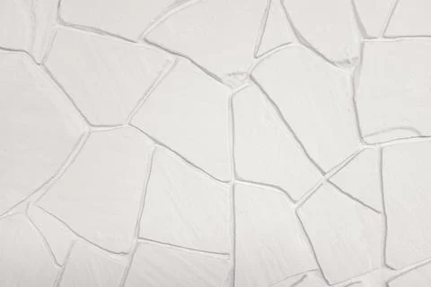Painted decorative plaster imitating a stone wall Stock Photos