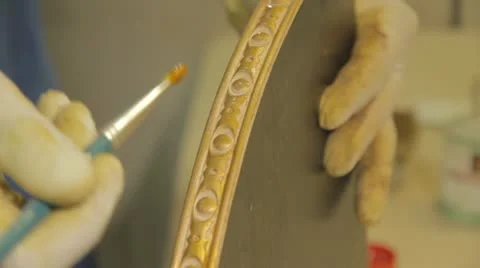 Painted details in gold  Stock Footage 11360746