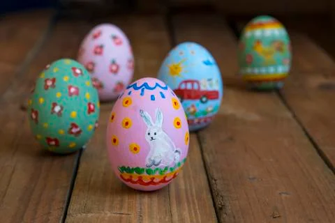 Painted easter chicken egg, drawing of a white rabbit Stock Photos