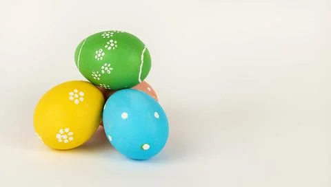 Painted Easter colored eggs isolated on white background close-up. Easter Stock Photos