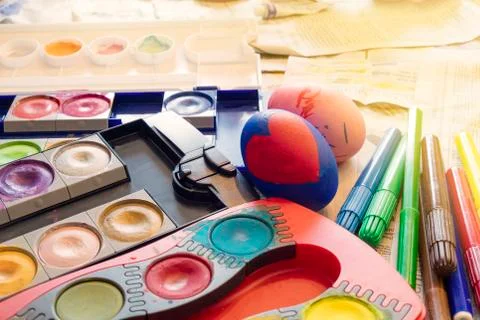 Painted Easter egg and colorful watercolors Stock Photos