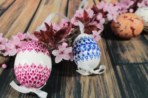 Painted Easter egg with cherry branch Stock Photos