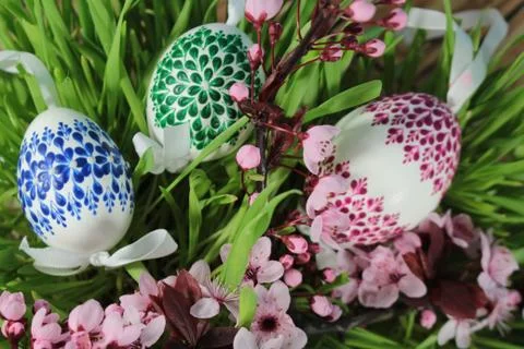 Painted Easter egg with cherry branch Stock Photos