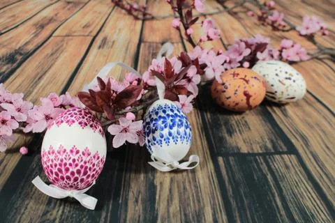 Painted Easter egg with cherry branch Stock Photos