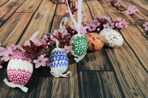 Painted Easter egg with cherry branch Stock Photos