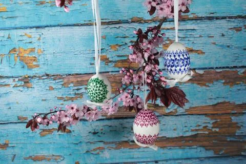 Painted Easter egg with cherry branch Stock Photos