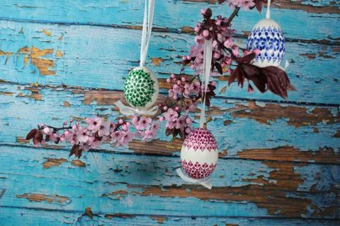 Painted Easter egg with cherry branch Stock Photos