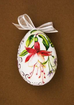 Painted Easter egg with red flower Stock Photos