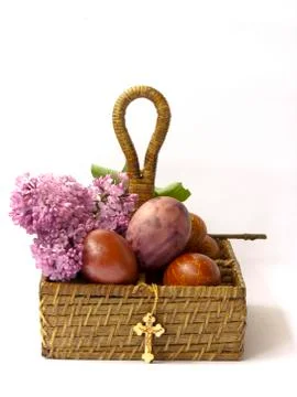 Painted easter eggs in basket Stock Photos