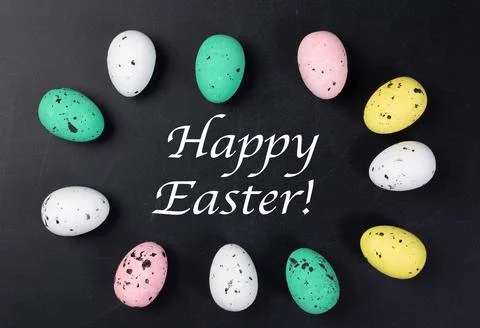 Painted Easter eggs in a circle with Happy Easter text Stock Photos