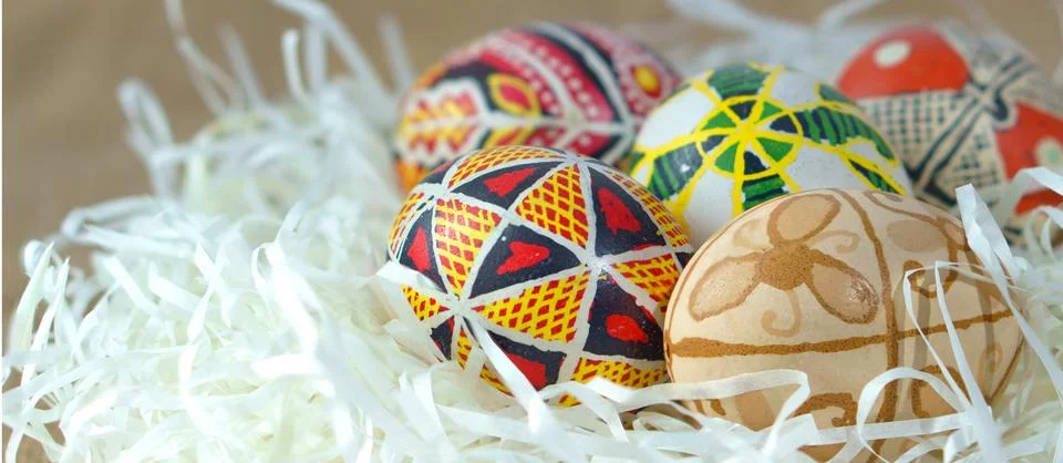 Painted Easter eggs close-up. Happy Easter. Traditional Ukrainian ornament. Stock Photos